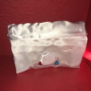 Opal silk makeup clutch by Doodlez